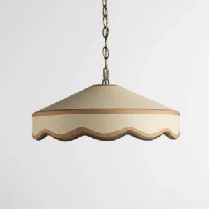 Wide scalloped pendant light side profile showing brass suspension chain and fabric texture detail