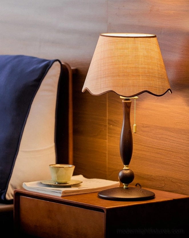 Scalloped table lamp back view showing cream linen shade construction fabric frame walnut trim and turned walnut wood spindle base structure