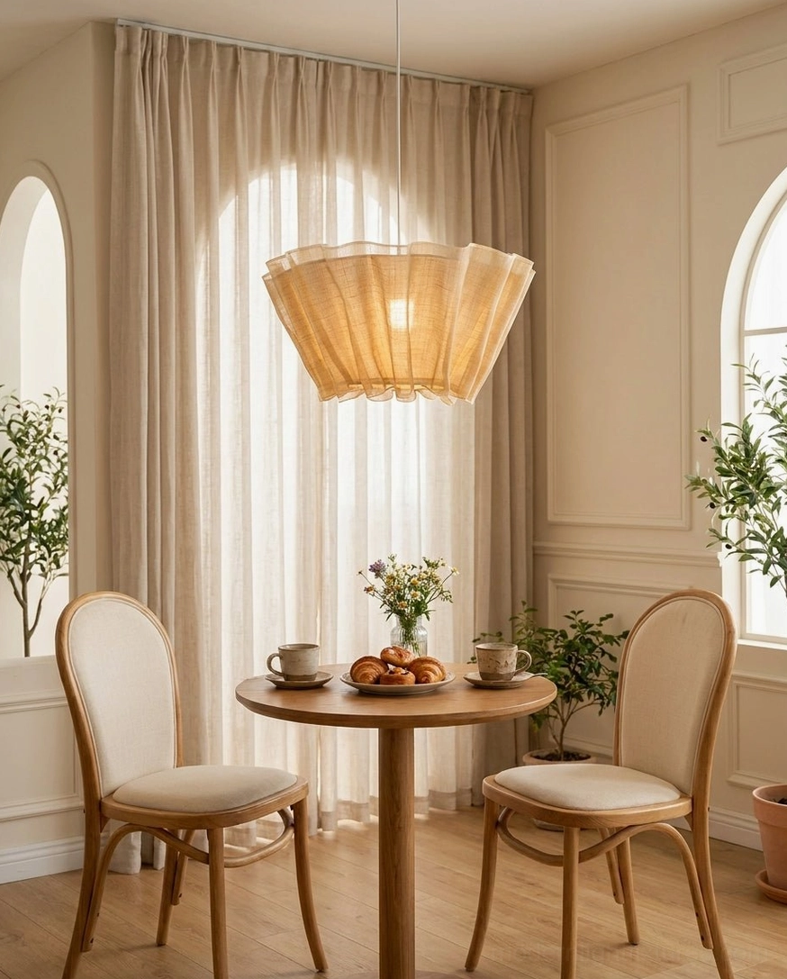 Scallora pendant light over dining table in dual arch-window dining room, warm rustic minimalist design, natural ambient atmosphere