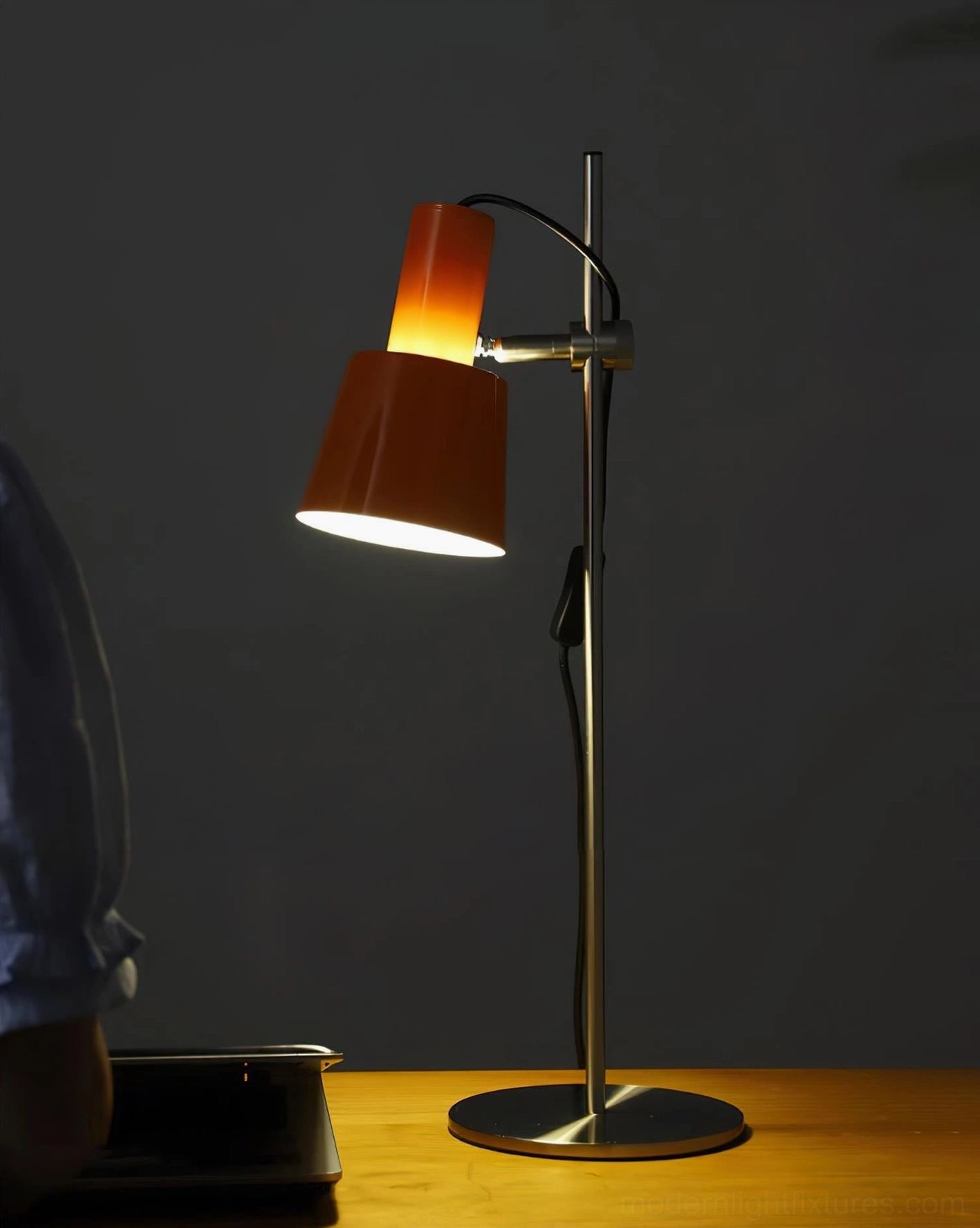 Scandinavian-inspired adjustable table lamp combining functionality with elegant minimalist design