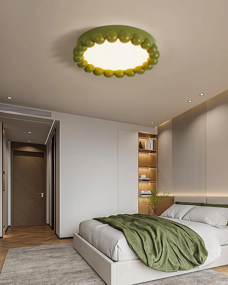 Beaded ceiling light fixture mounted in Scandinavian minimalist bedroom interior design