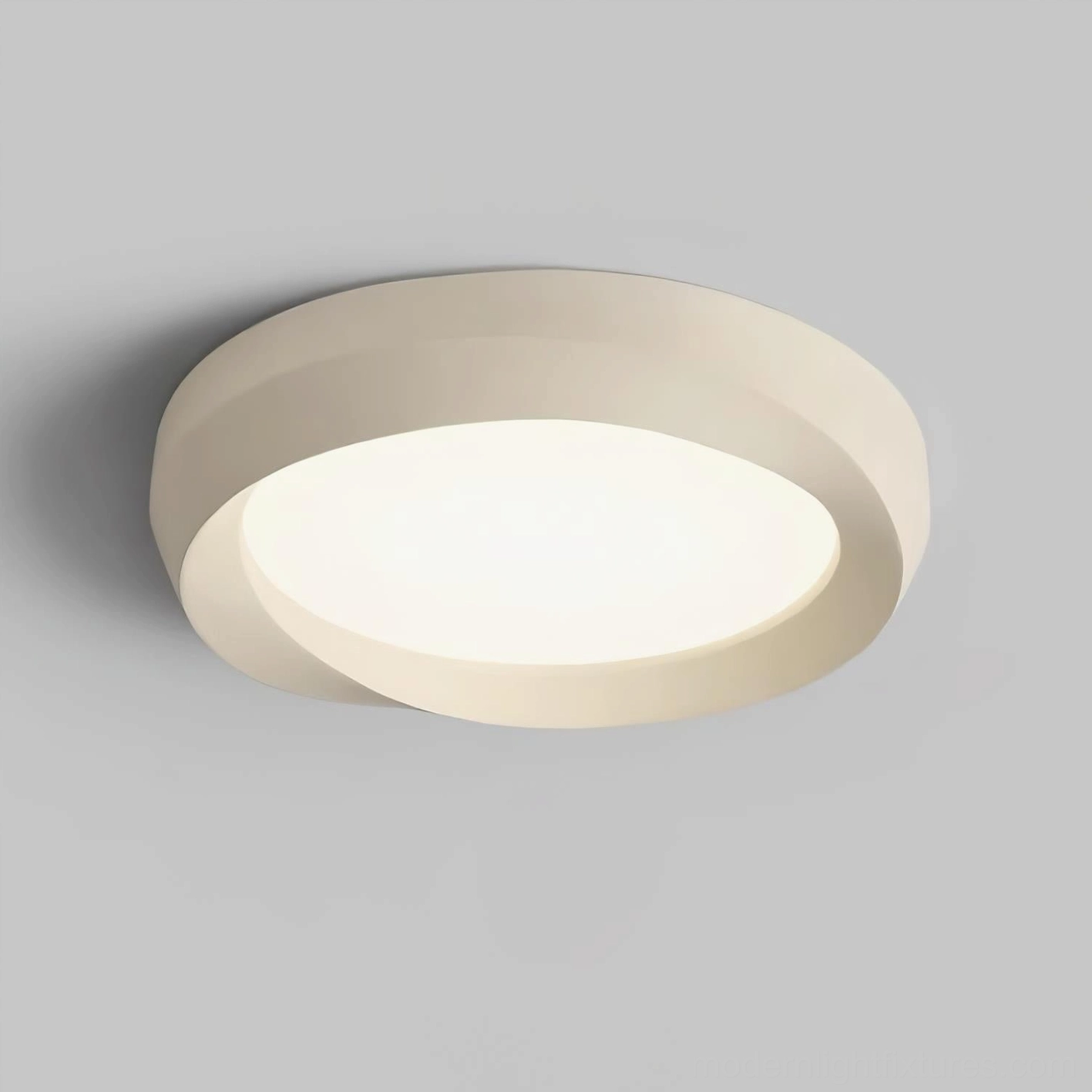 Angled close-up view of contemporary circular flush mount ceiling lamp showing layered design detail