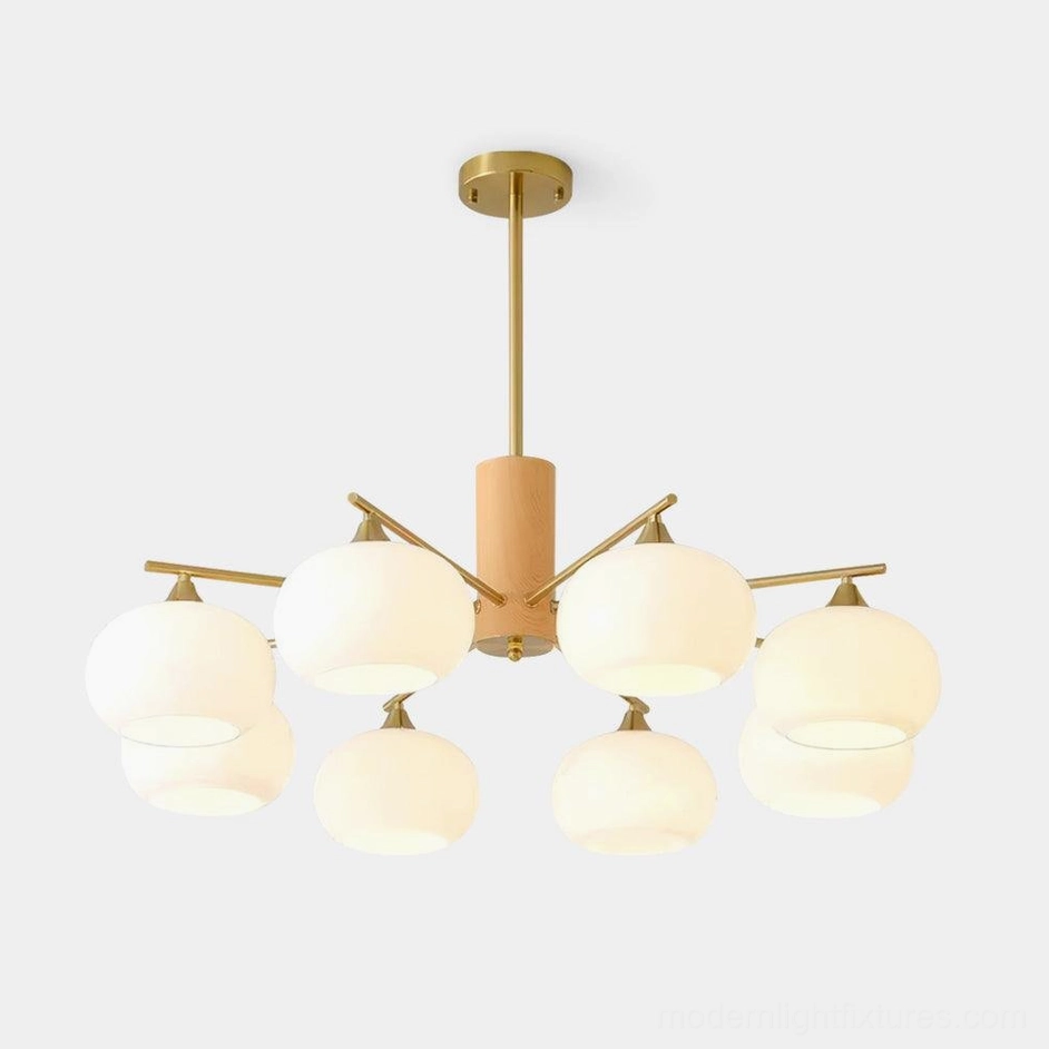 8-head scandinavian glass pendant chandelier with wooden brass frame and opal white shades studio view
