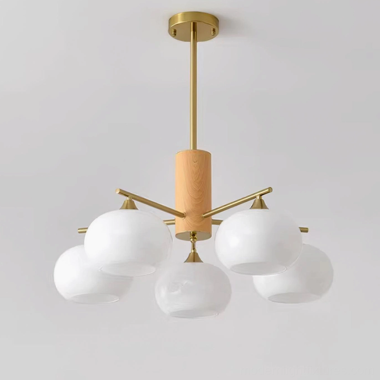Modern scandinavian glass chandelier with natural wood accents and brass arms ceiling light