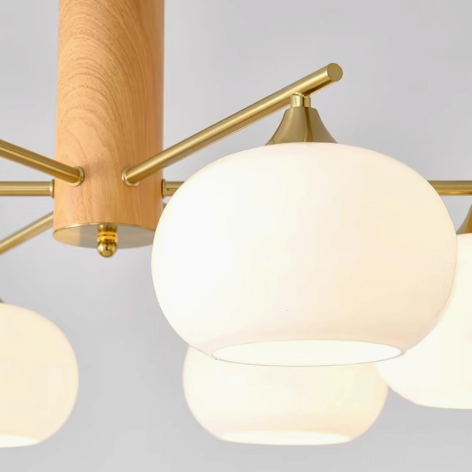 Scandinavian glass pendant chandelier with curved brass arms and wooden frame design detail