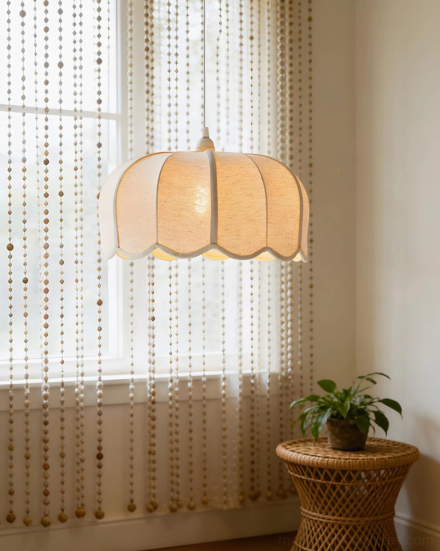 Scandinavian modern pendant fixture with organic curves and natural fabric materials