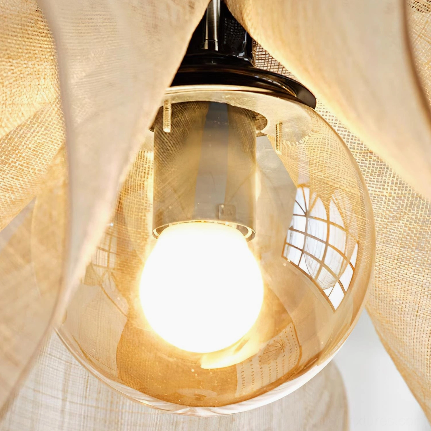 Modern petal pendant light fixture with natural jute material in Scandinavian minimalist interior style setting