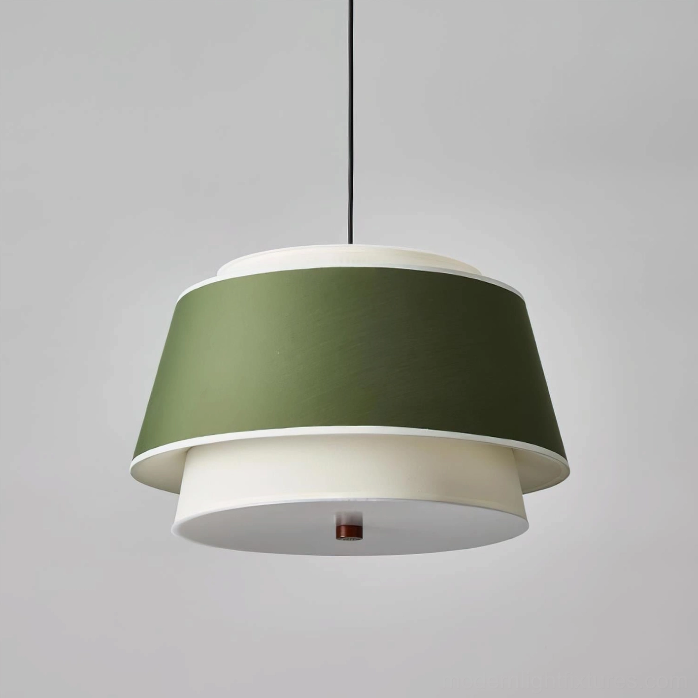 Scandinavian tiered pendant fixture above dining table intimate Nordic dining room ambiance