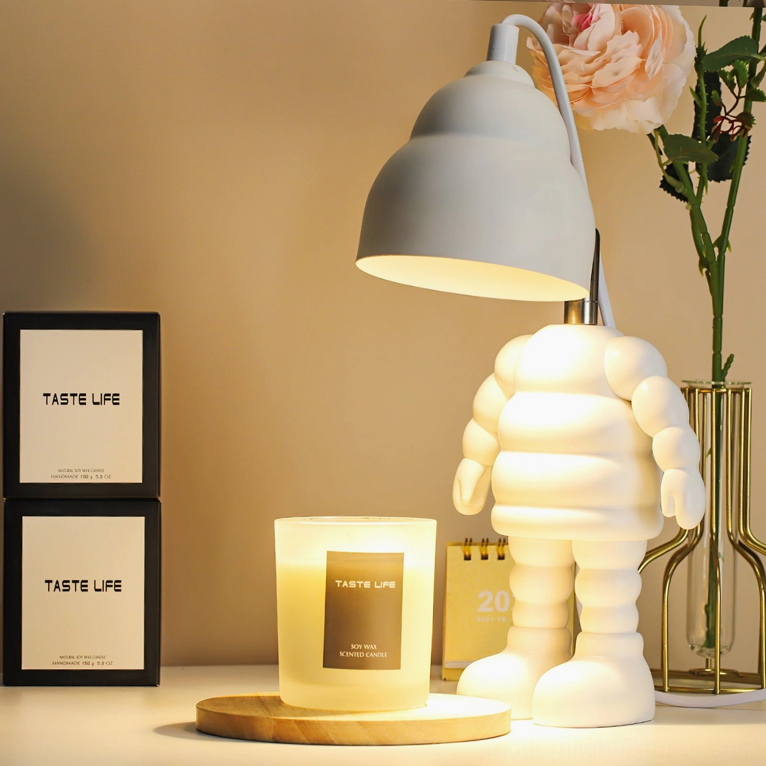 Nordic minimalist robot candle warmer lamp with warm ambient lighting and adjustable metal support structure