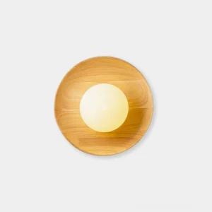 Scandinavian round wooden wall sconce with frosted glass shade, front view on white background