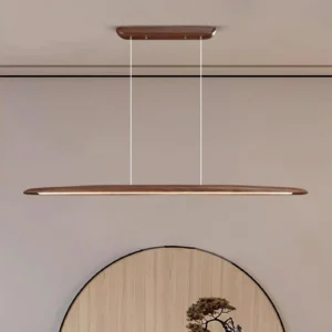 Contemporary minimalist LED pendant chandelier showing sleek elongated form and warm white light distribution