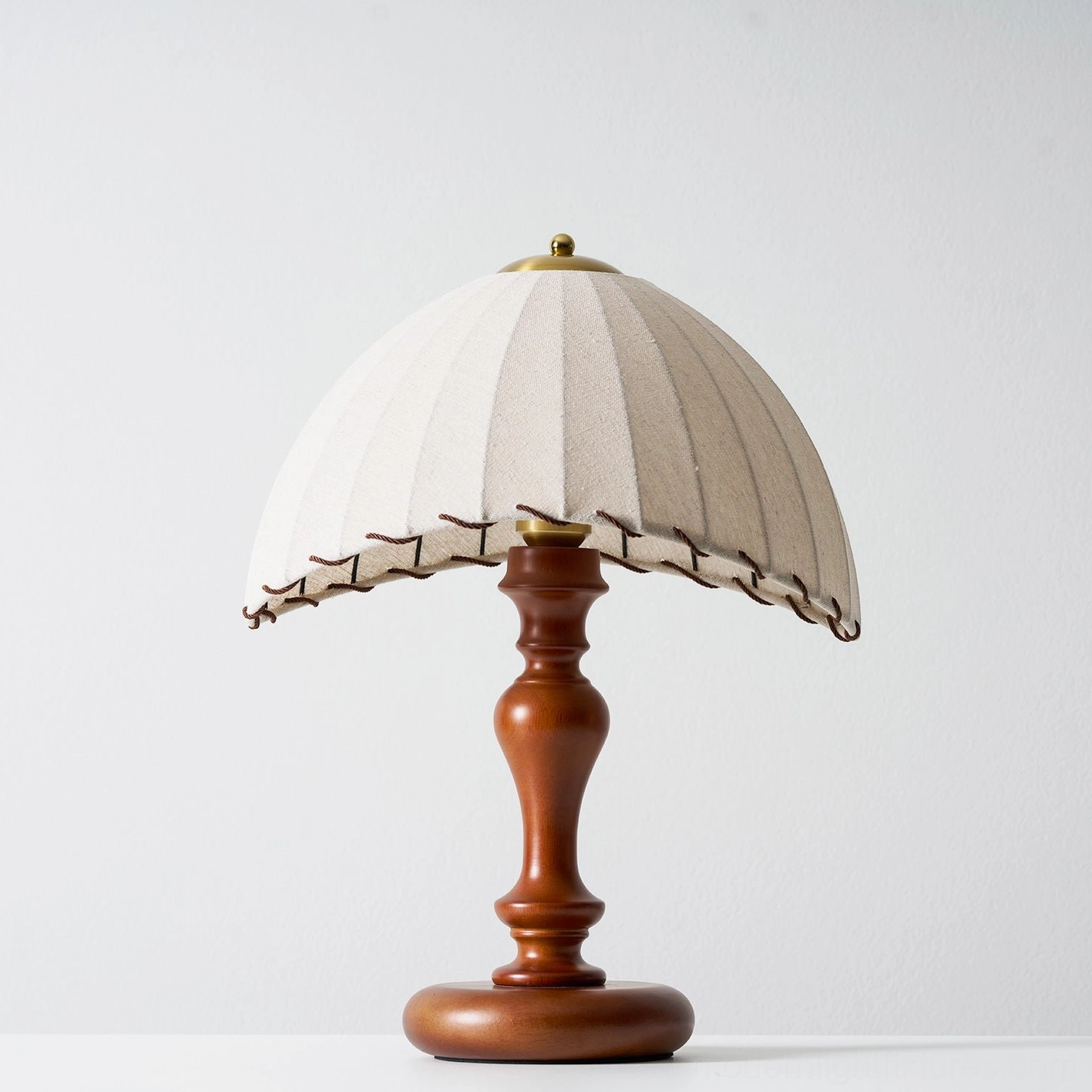 Scandinavian inspired table lamp with natural materials and minimalist design aesthetic