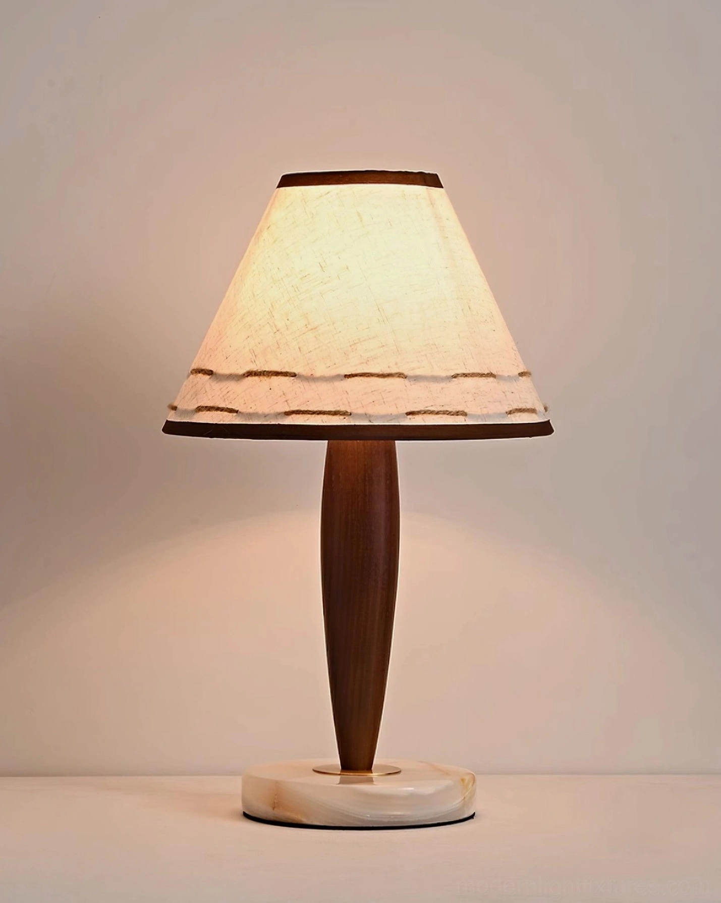 Scandinavian minimalist bedroom with terracotta table lamp - rustic-modern warm focal point