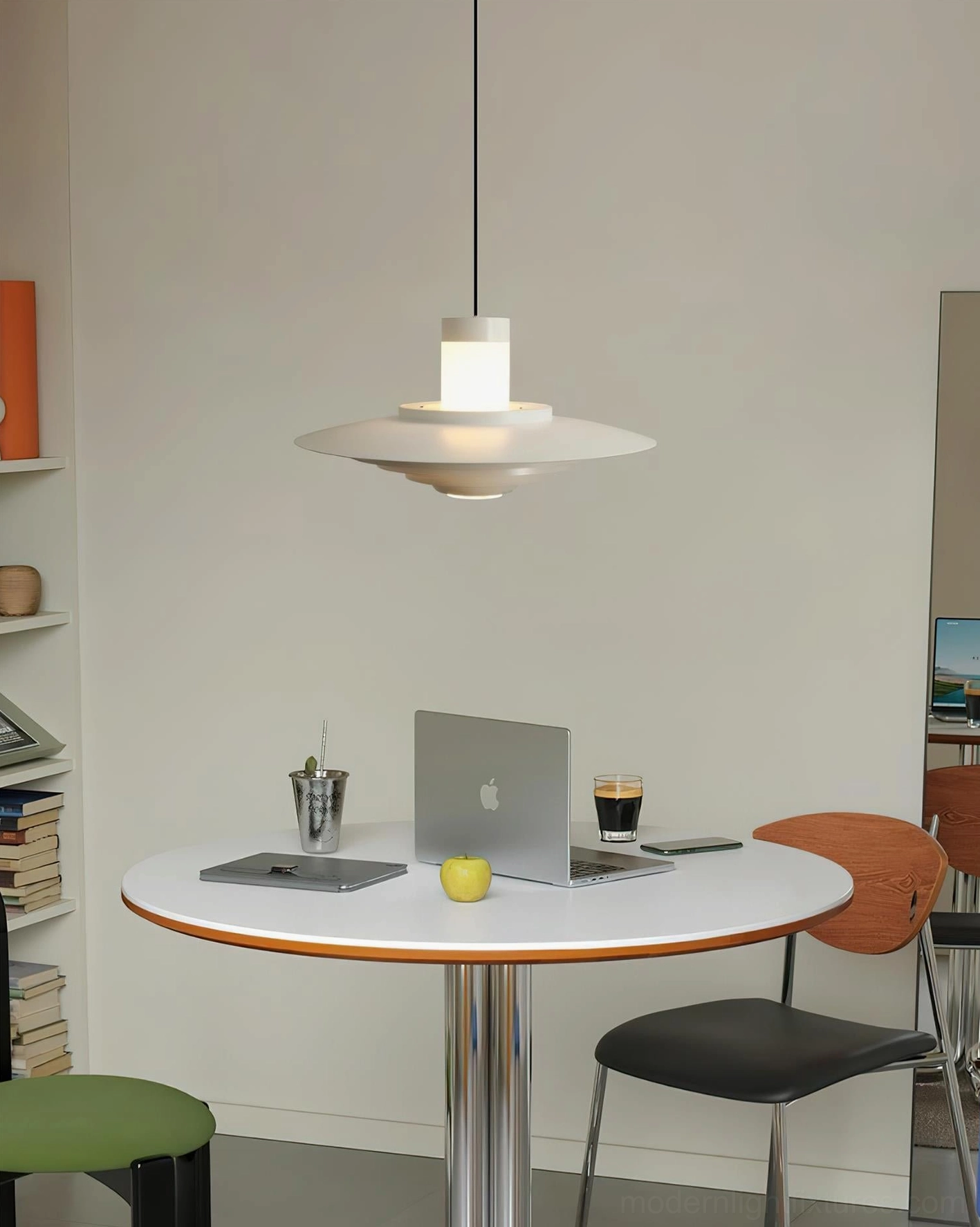 Minimalist Scandinavian tiered pendant light in off-white finish suspended in contemporary dining space with clean interior design