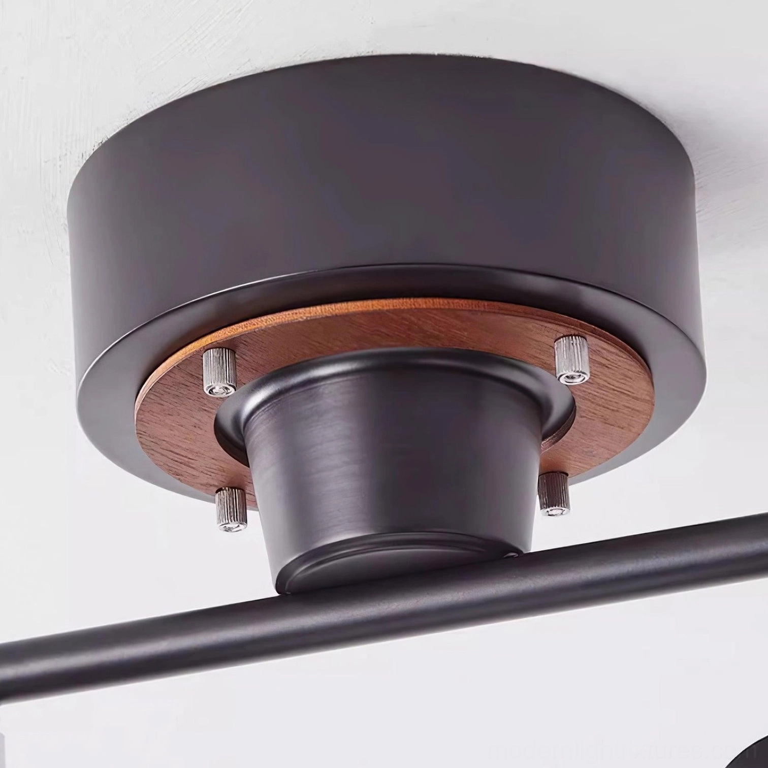 Track lighting ceiling fixture in Scandinavian interior with white frame and natural wood elements