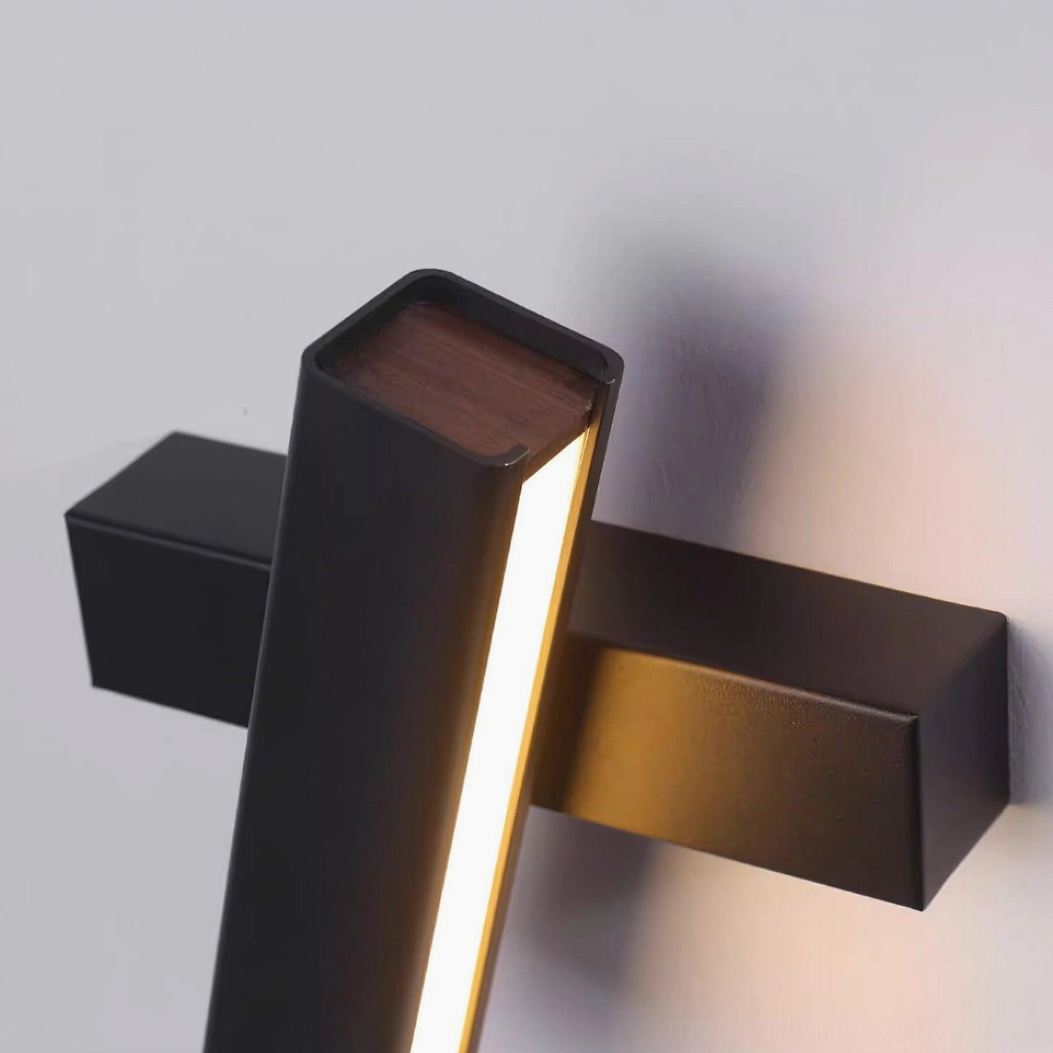 Scandinavian minimalist wall lamp installed in bedroom providing task and ambient lighting solution
