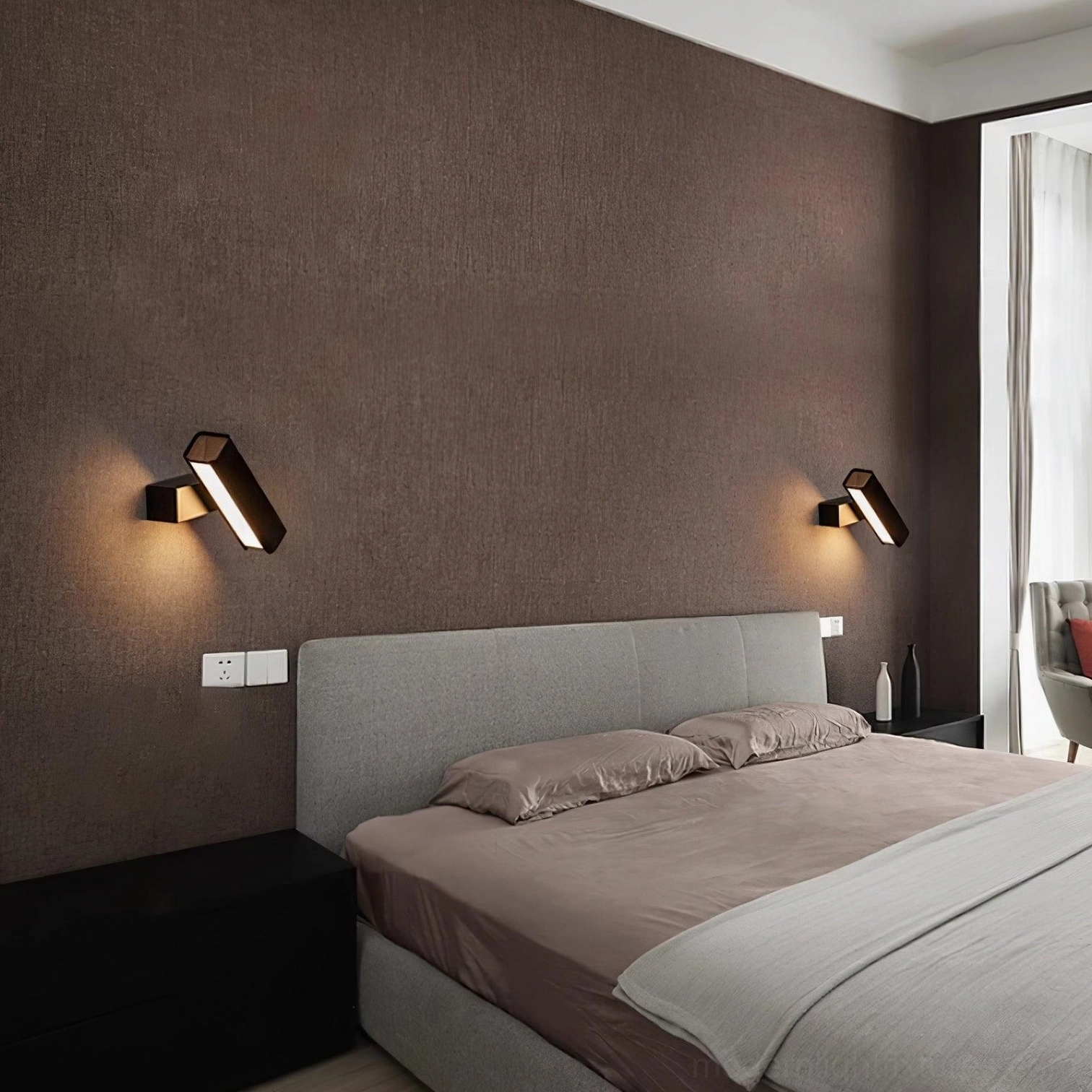 Scandinavian minimalist wall sconce in studio lighting setup showing product detail and finish