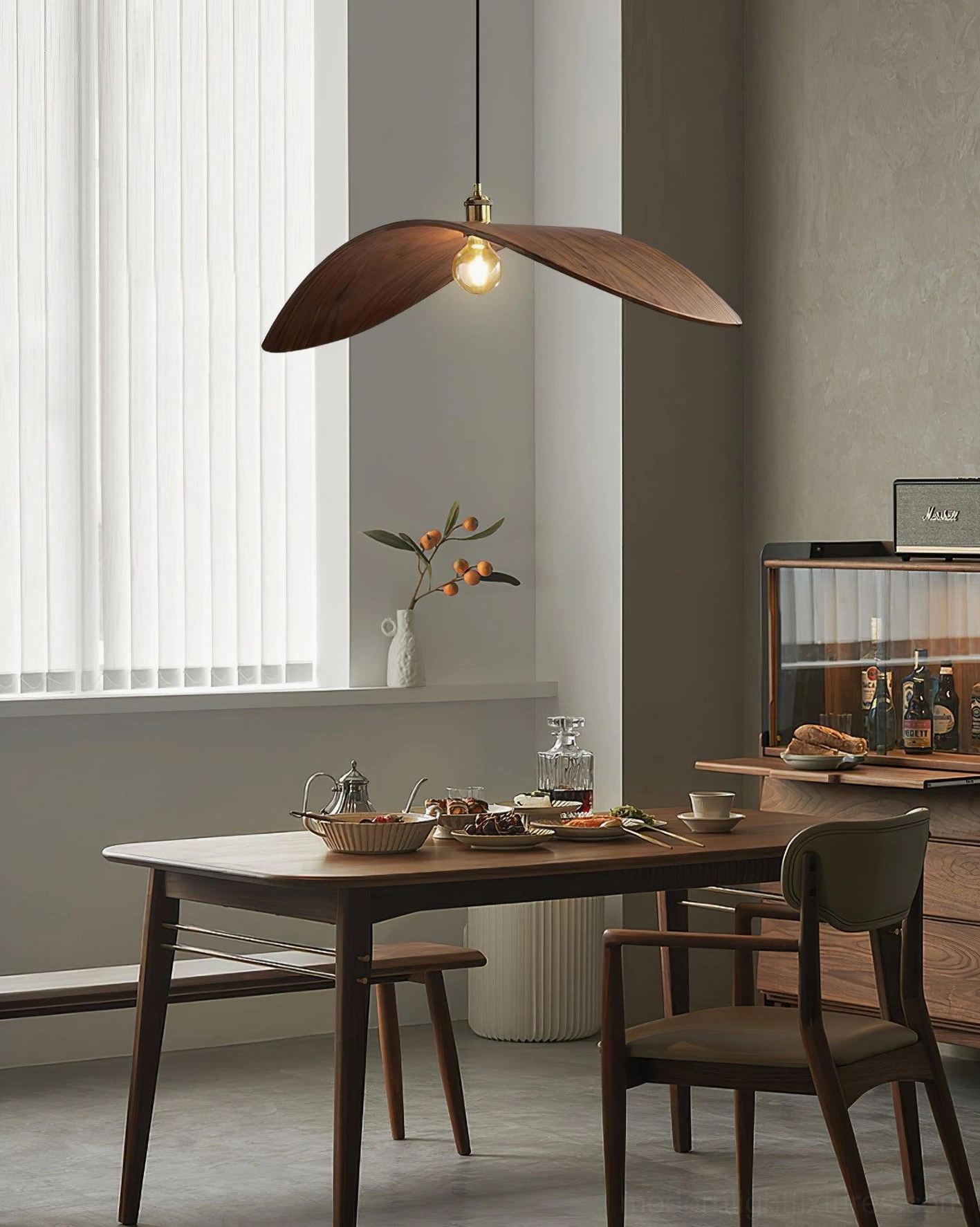 Walnut leaf pendant lamp in Scandinavian minimalist interior design setting with clean lines and natural materials