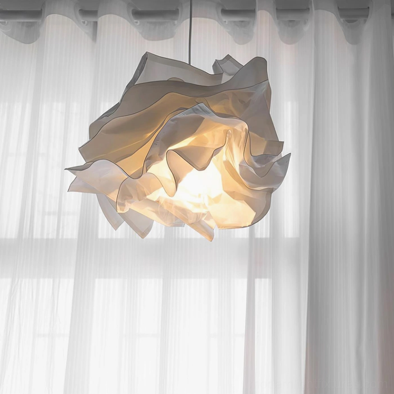 Modern white paper pendant lamp with sculptural elegance in Scandinavian styled interior