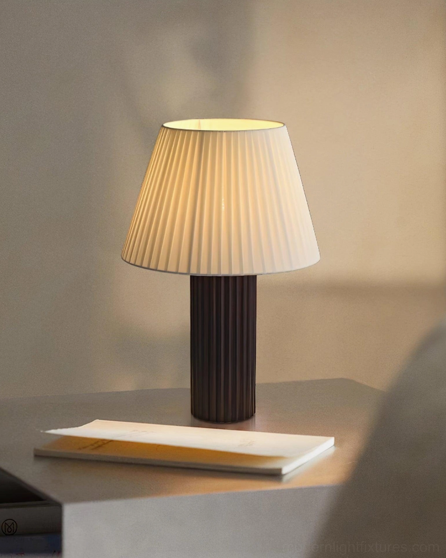 Natural wood pleated shade table lamp in scandinavian design interior with modern furnishings and warm ambient lighting for cozy living space