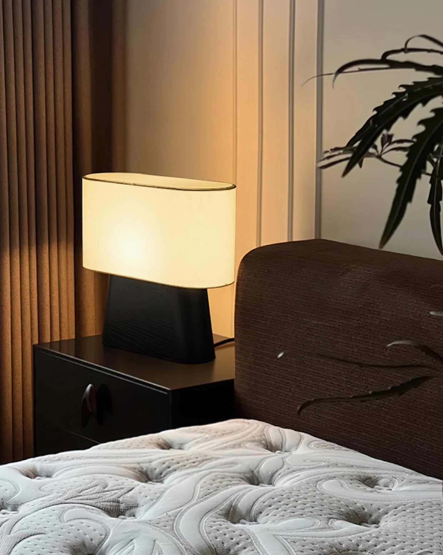 Scandinavian-style wood table lamp creating warm ambient lighting in contemporary interior