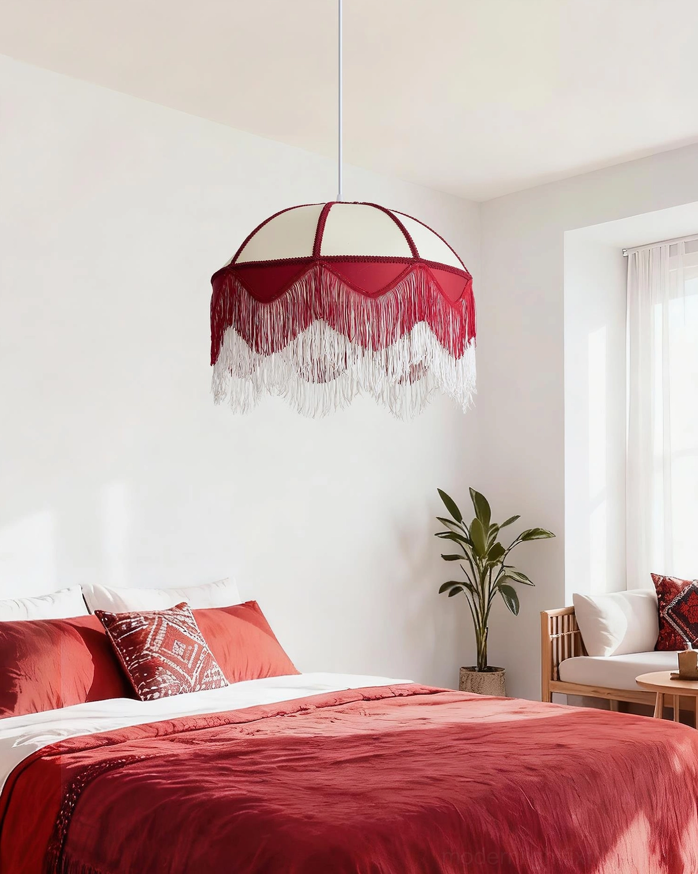 Fringe Pendant Light in bohemian bedroom with red bedding and patterned pillows creating warm ambiance
