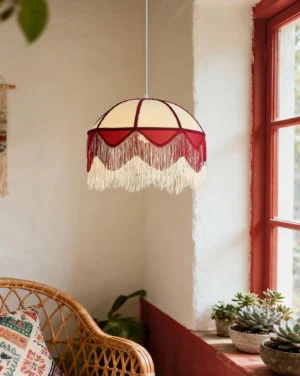 Bohemian Fringe Pendant Light installed in cozy residential room with red window frame and rattan accents