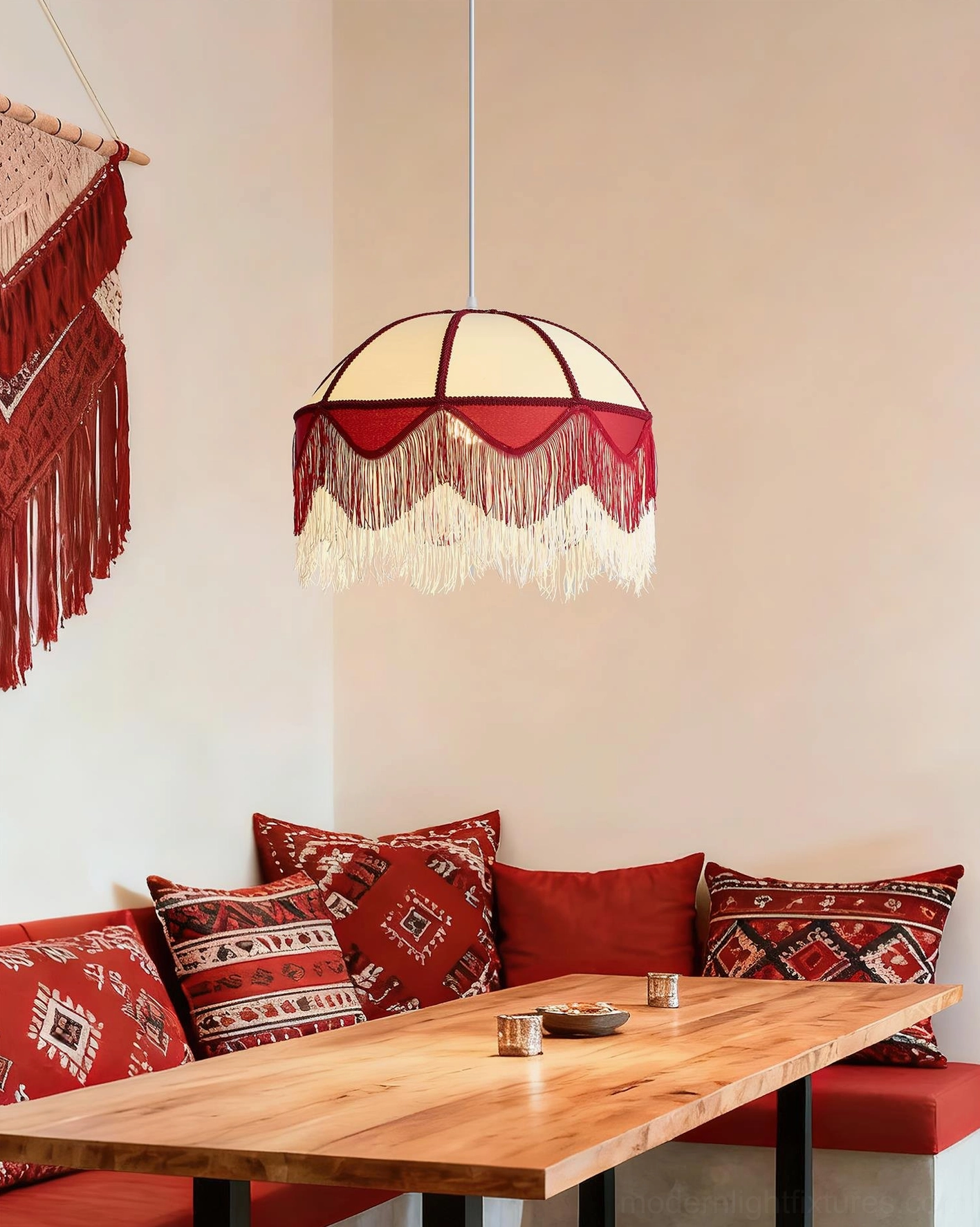 Bohemian Fringe Pendant Light illuminating dining room with wooden table and burgundy patterned textiles