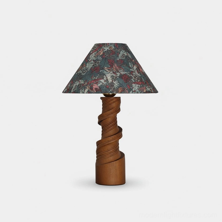 Scrollroot sculptural table lamp with twisted solid wood base and floral conical fabric shade in walnut finish, studio front view