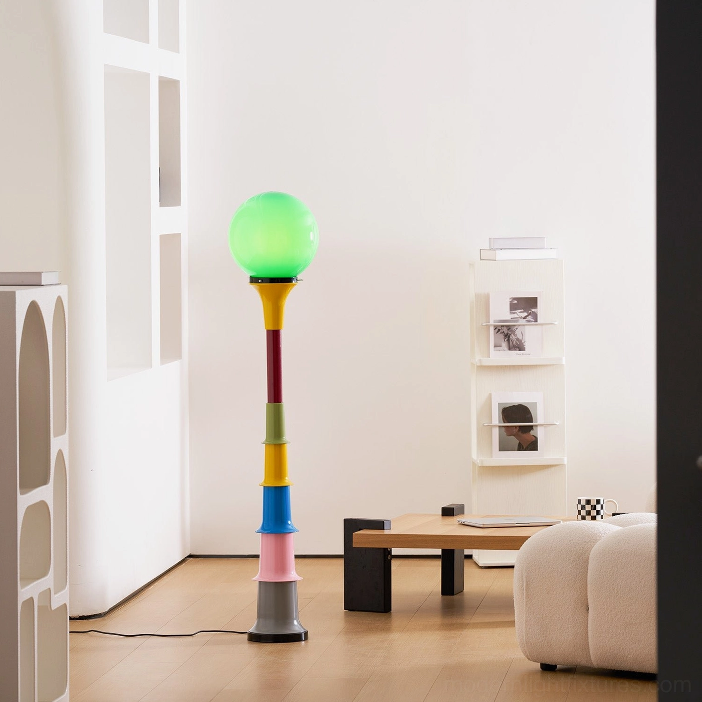 Contemporary colorful floor lamp with stacked base creating sculptural lighting feature