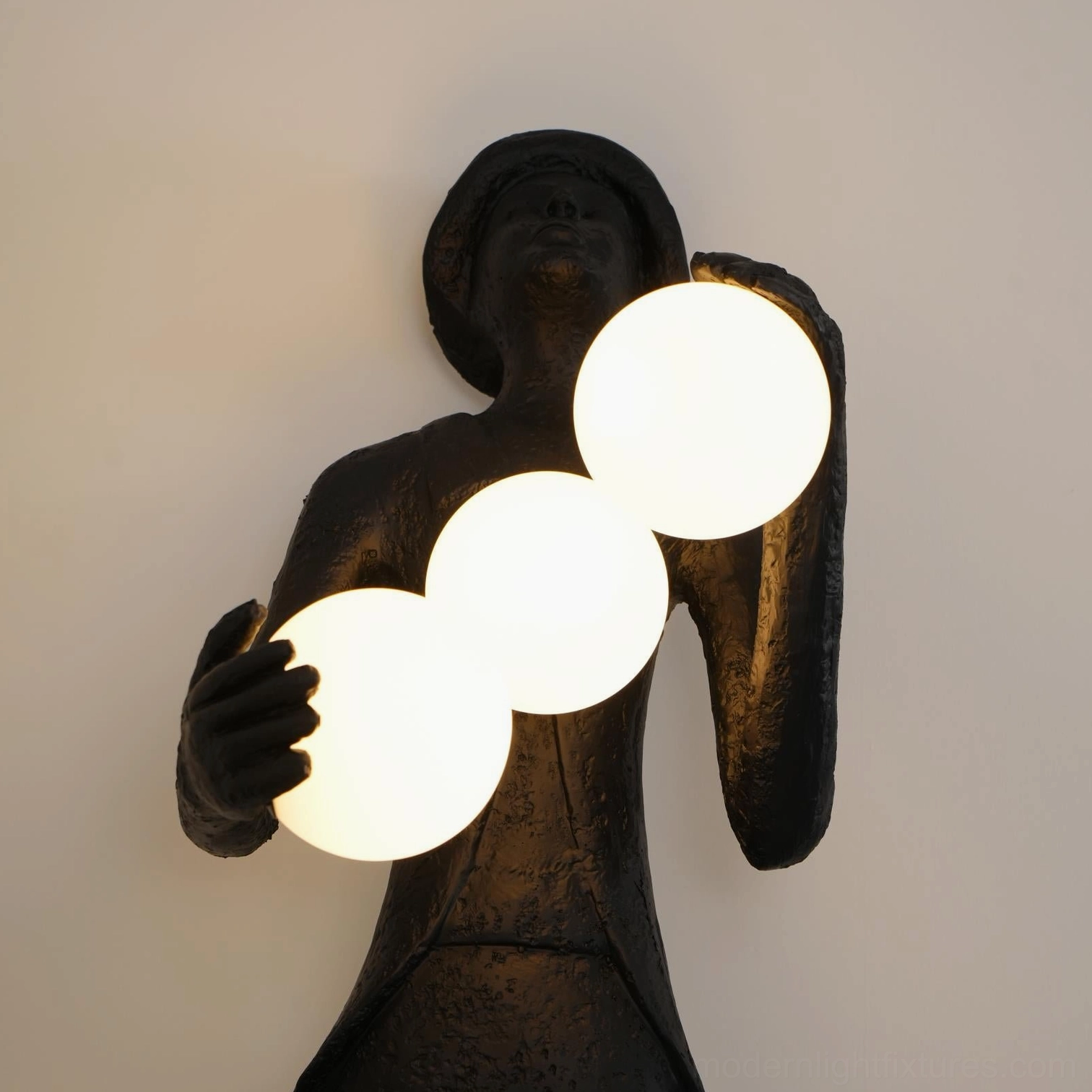 Black textured humanoid sculptural floor lamp with frosted glass globes minimalist geometric base