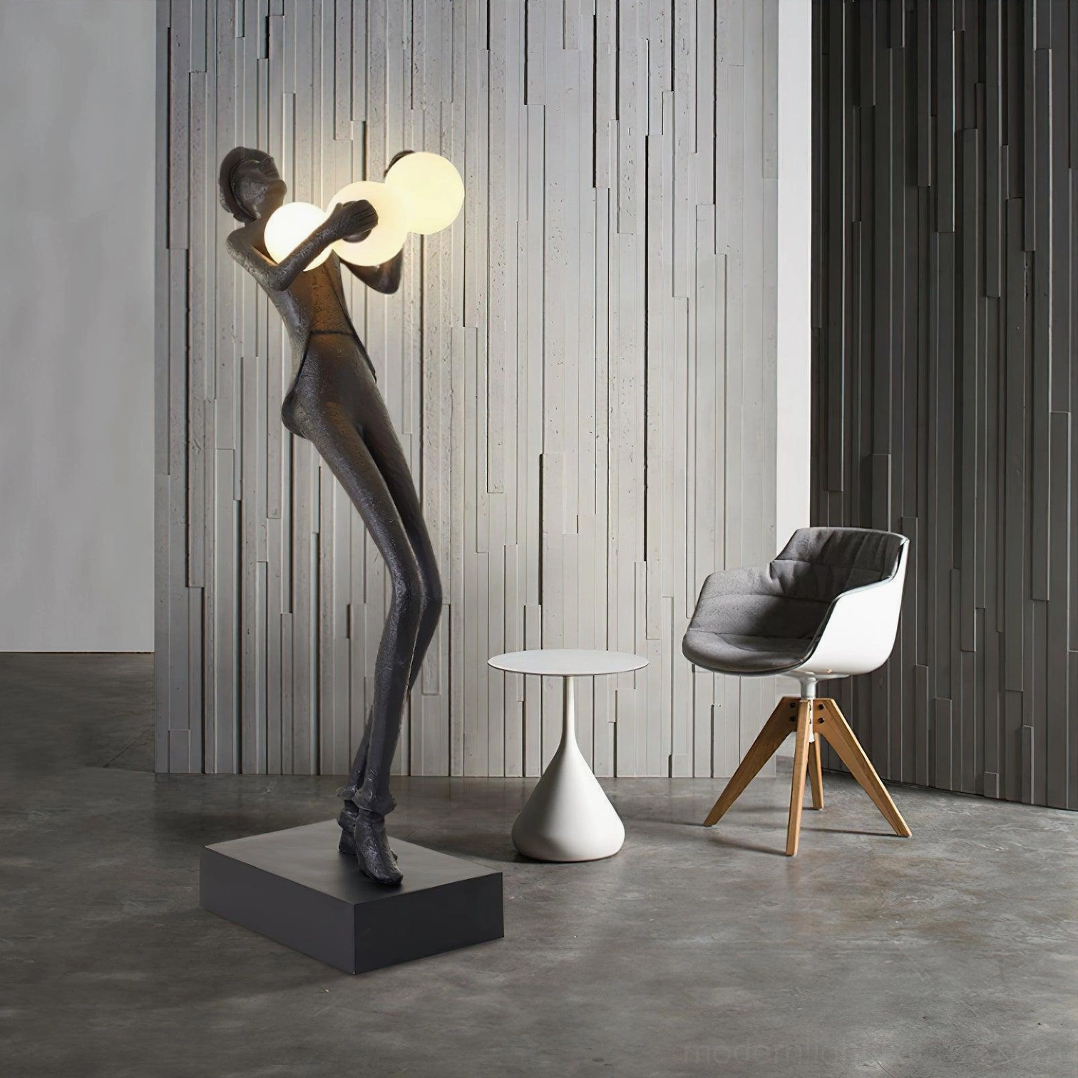 Contemporary humanoid sculptural floor lamp with two frosted glass orbs in modern residential lounge with seating furniture