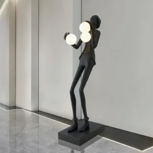 Modern humanoid sculpture floor lamp with three frosted glass globe lights in minimalist hallway interior design setting