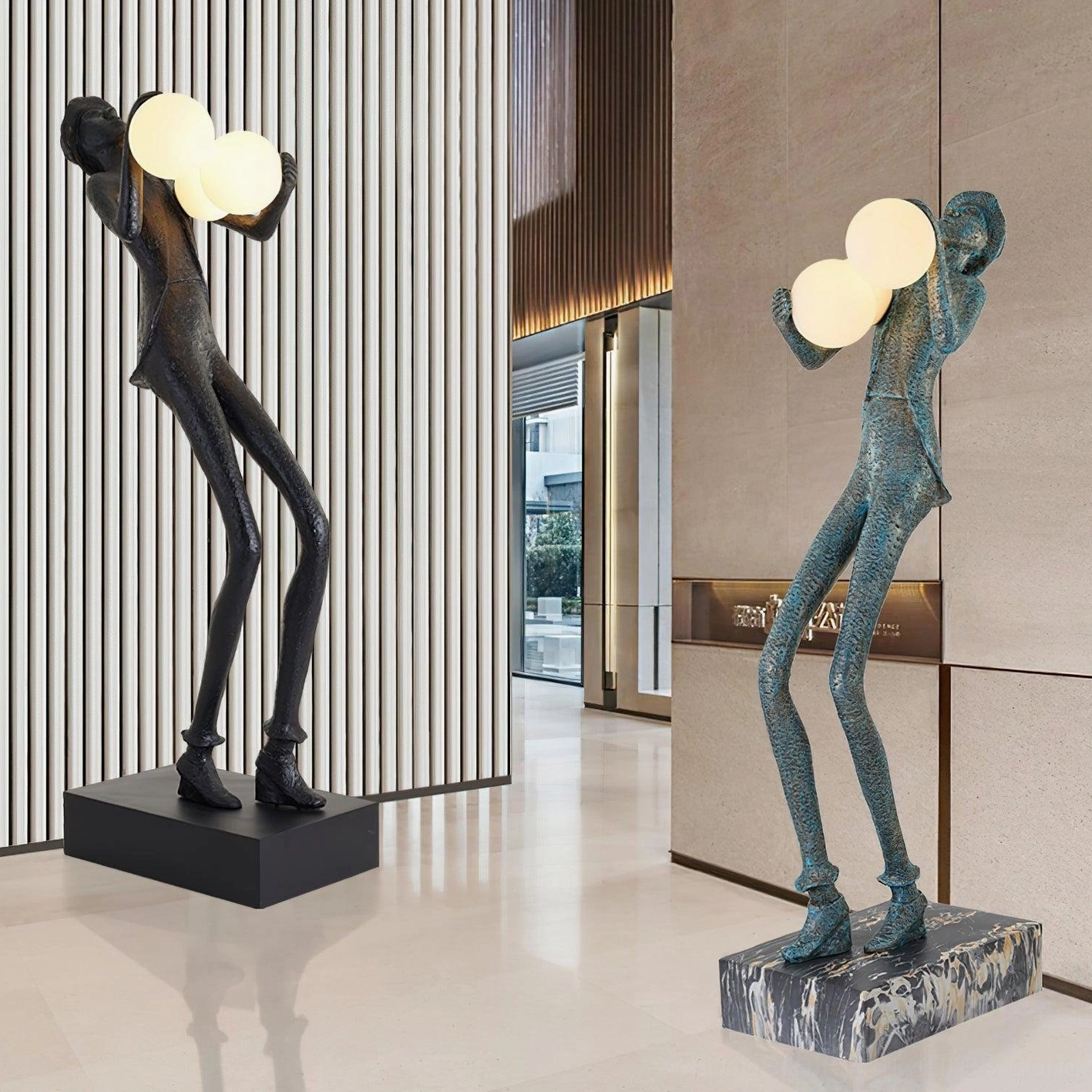 Two humanoid sculpture floor lamps comparison black with three globes and teal blue with two globes in modern commercial hallway