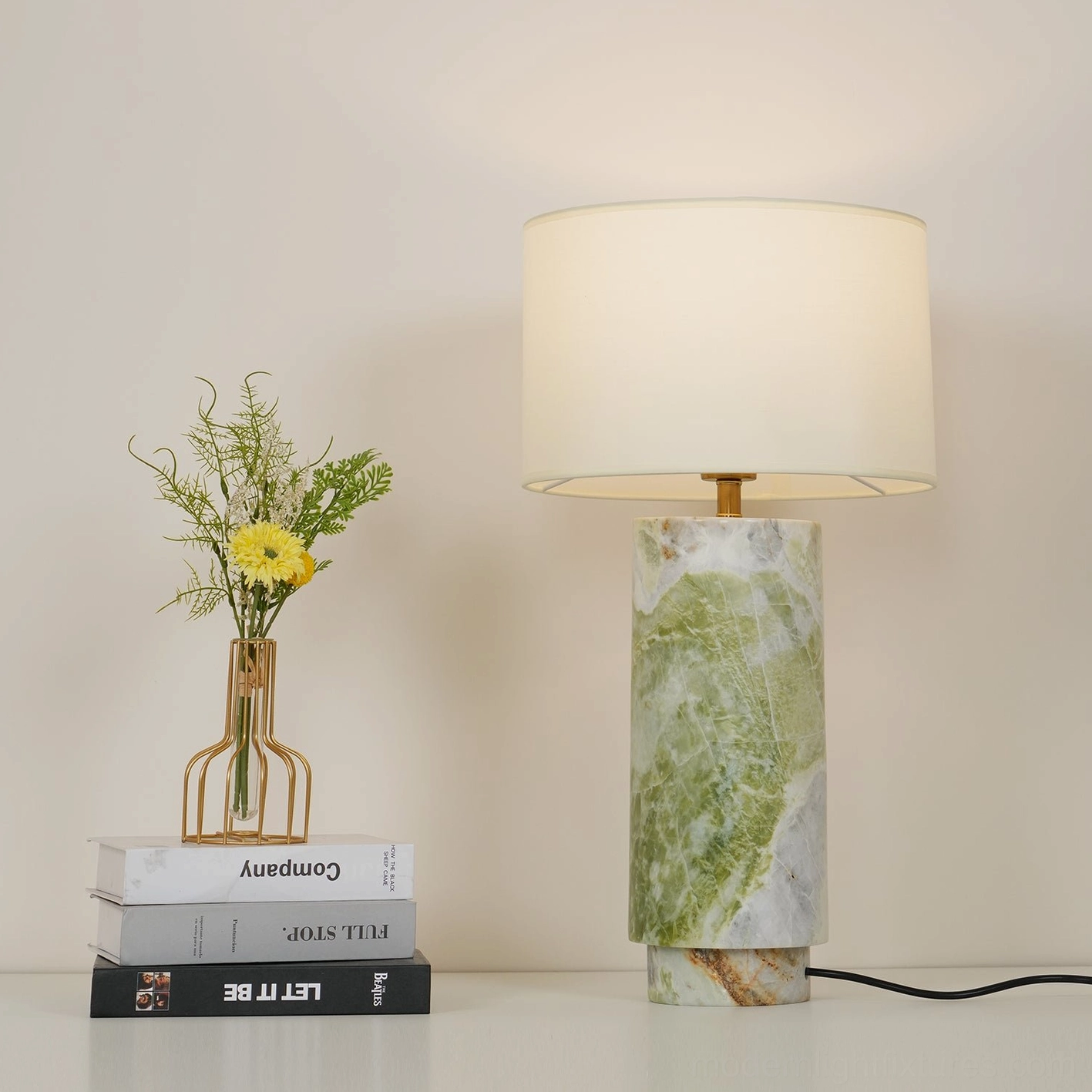 Sculptural marble table lamp base with fabric shade, artistic lighting solution for modern interiors
