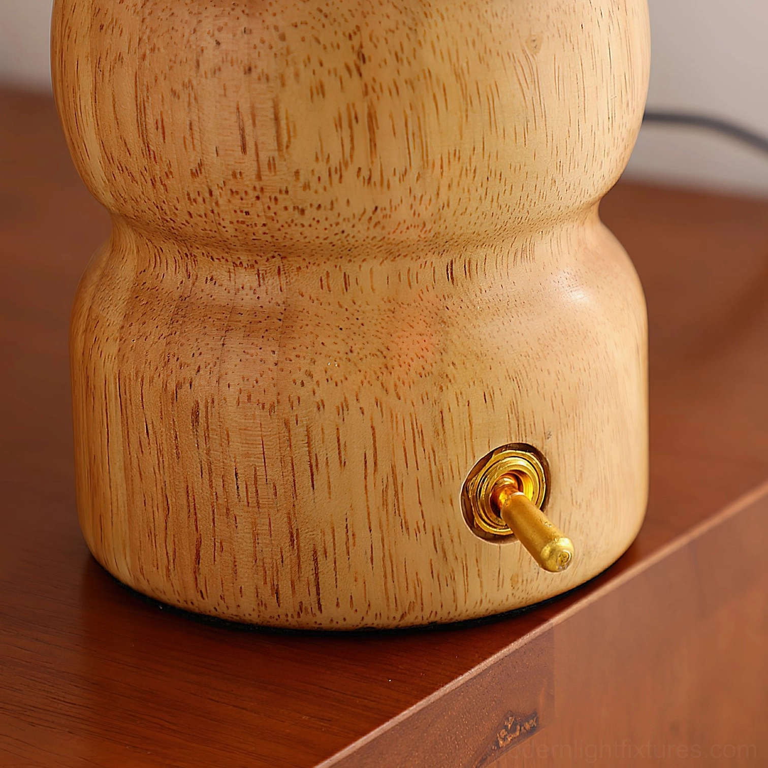 Sculptural mushroom table lamp with dome fabric shade and natural wood base artistic detail