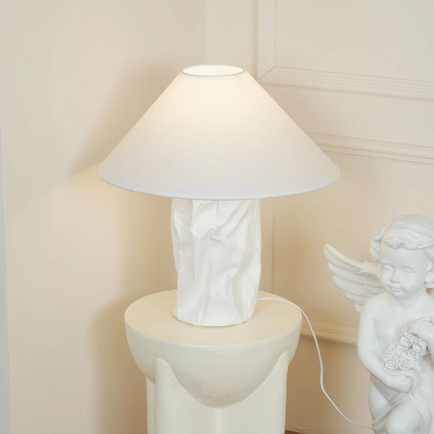 Contemporary handcrafted table lamp with sculptural white paper shade in home decor