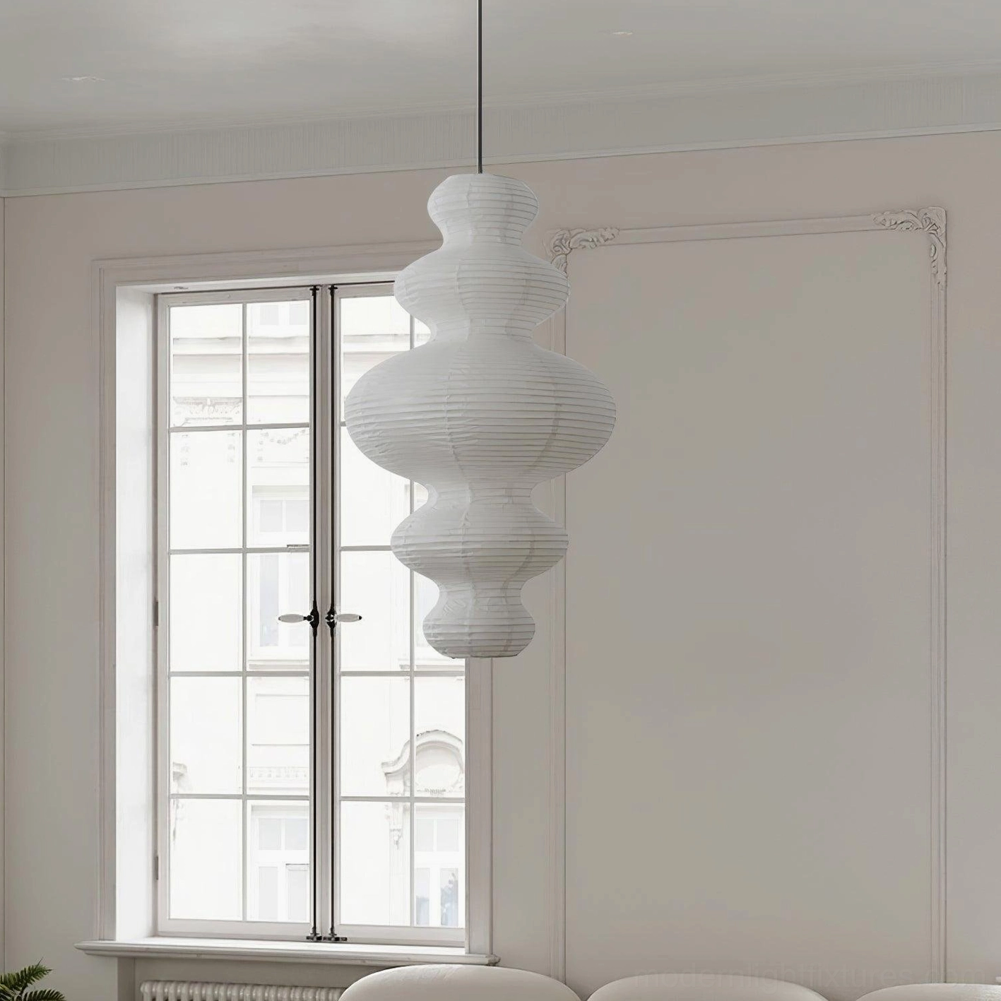 White sculptural hand-crafted rice paper pendant lamp featuring bamboo silk frame construction