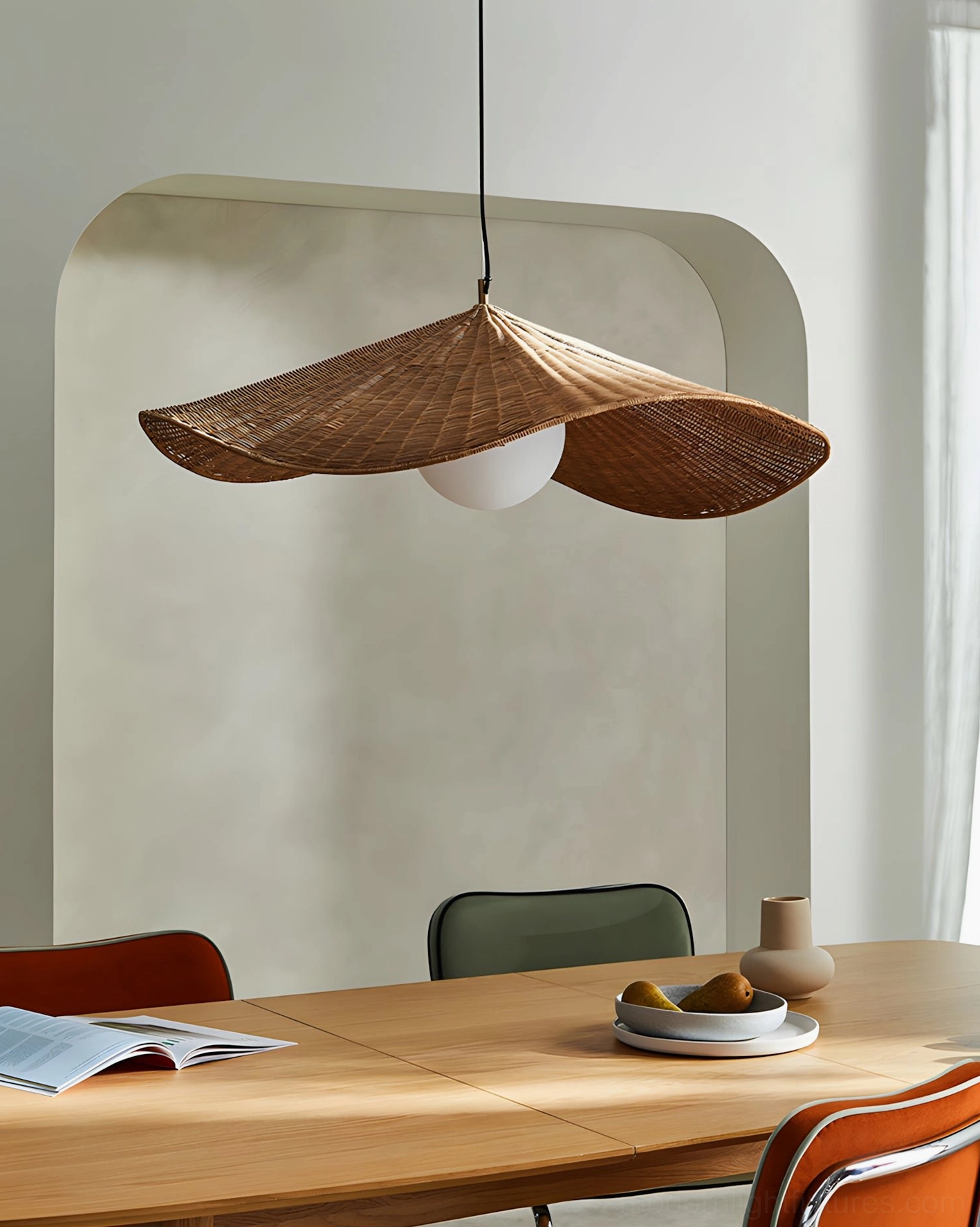 Wide angle view of flared rattan pendant lamp creating sculptural lighting statement in modern space