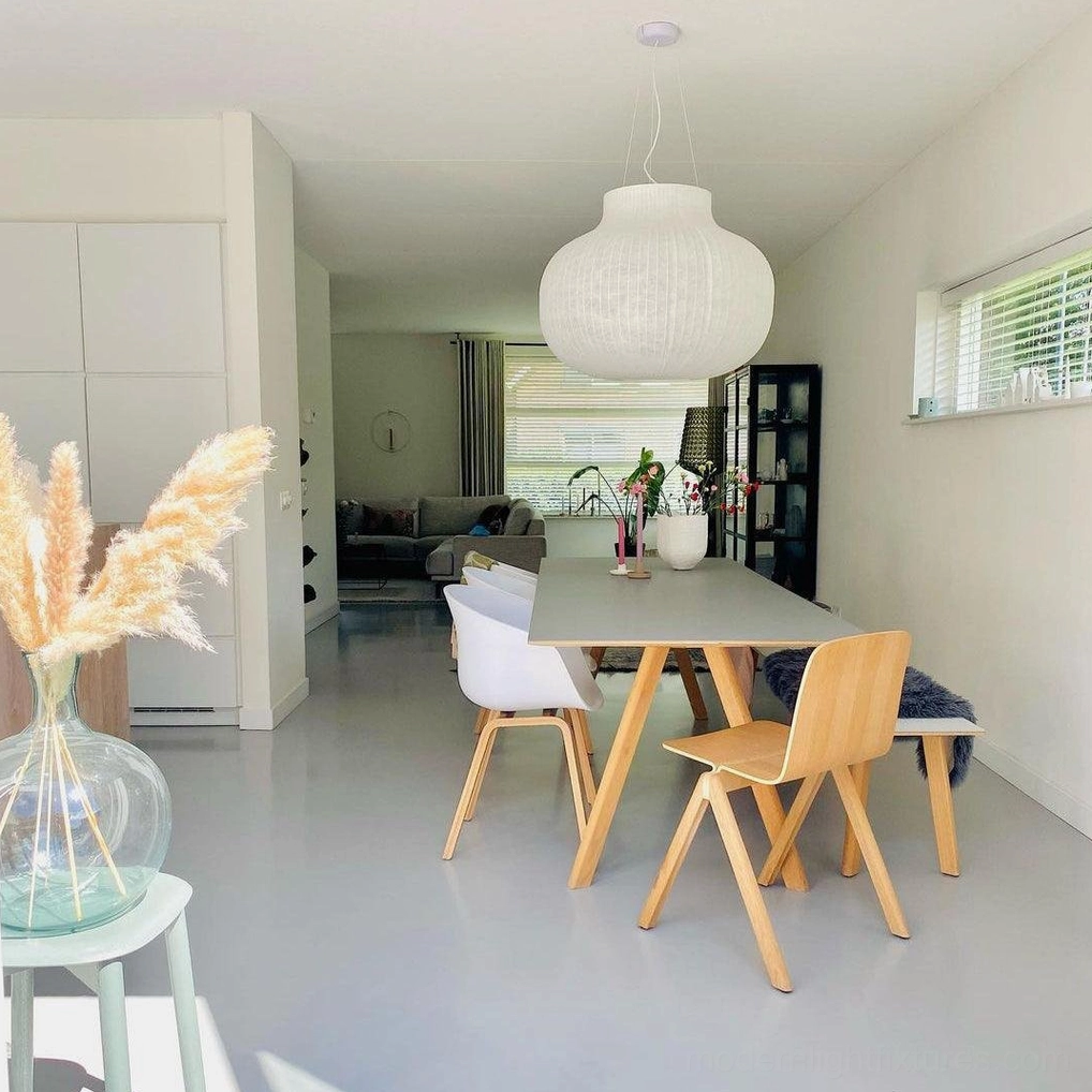White ribbed pendant light showing sculptural form and architectural design in contemporary space
