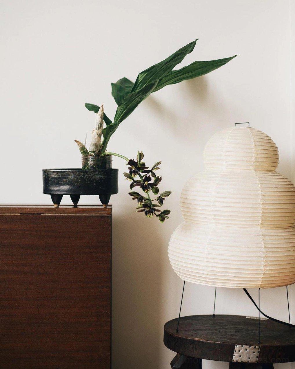 Contemporary sculptural tiered paper lamp, artistic lighting fixture in modern home