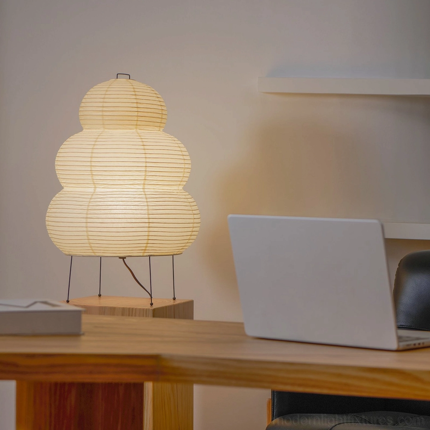 Sculptural tiered paper lamp artistic form, geometric construction and design details