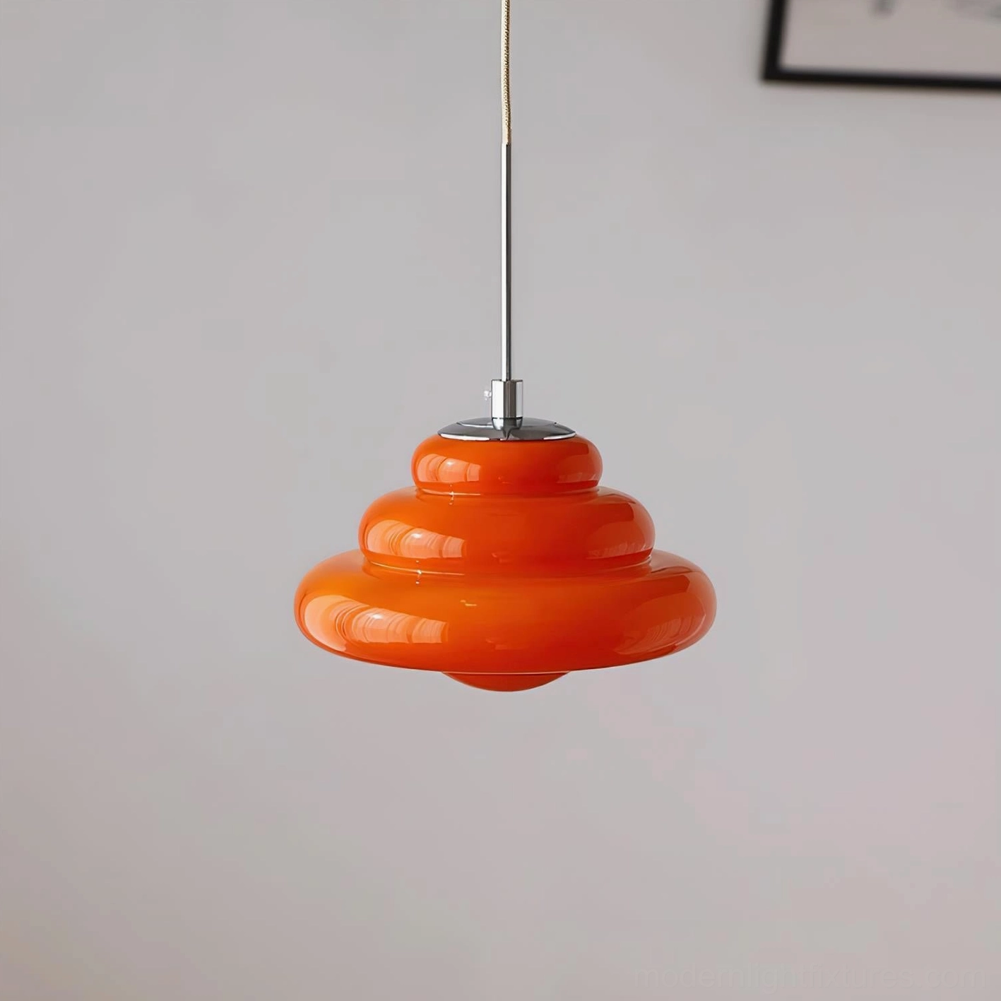 Sculptural tiered pendant lamp suitable for sloped ceiling installation up to 30 degrees