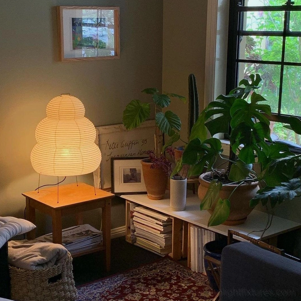 Sculptural tiered paper lamp in contemporary home setting, elegant ambient lighting solution