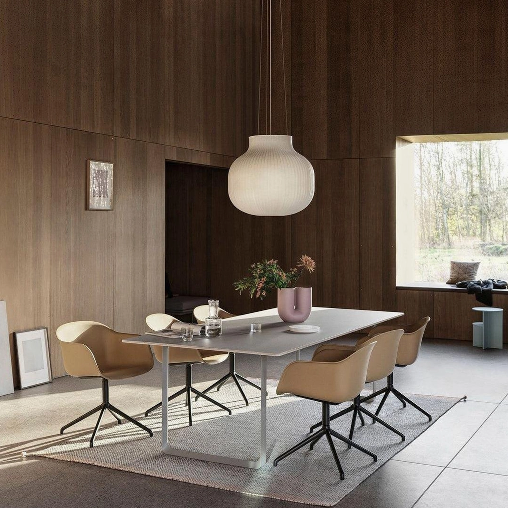 Contemporary pendant light fixture with sculptural white fabric shade in modern home decor