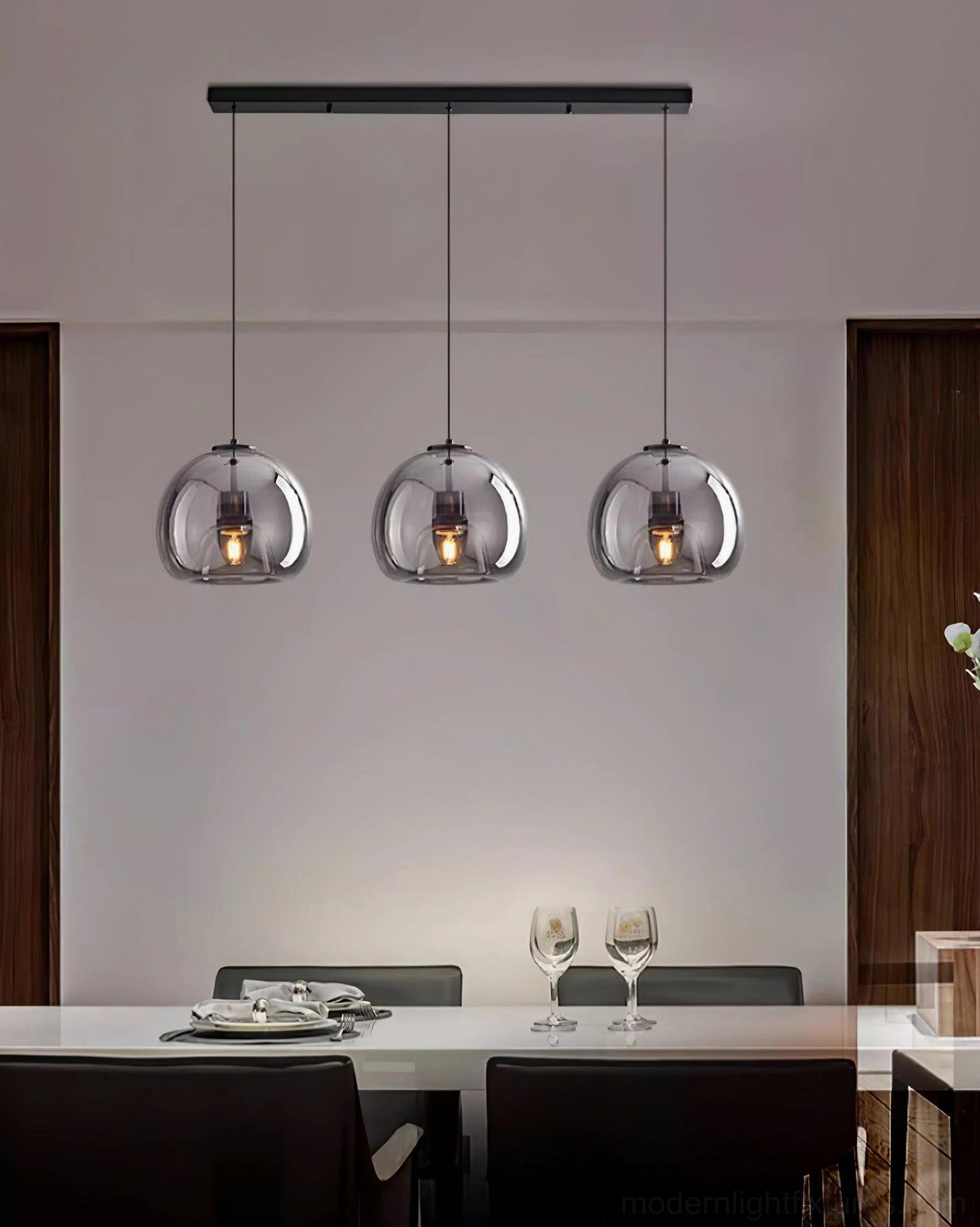 Sedona 3-head linear pendant light above kitchen island in contemporary home