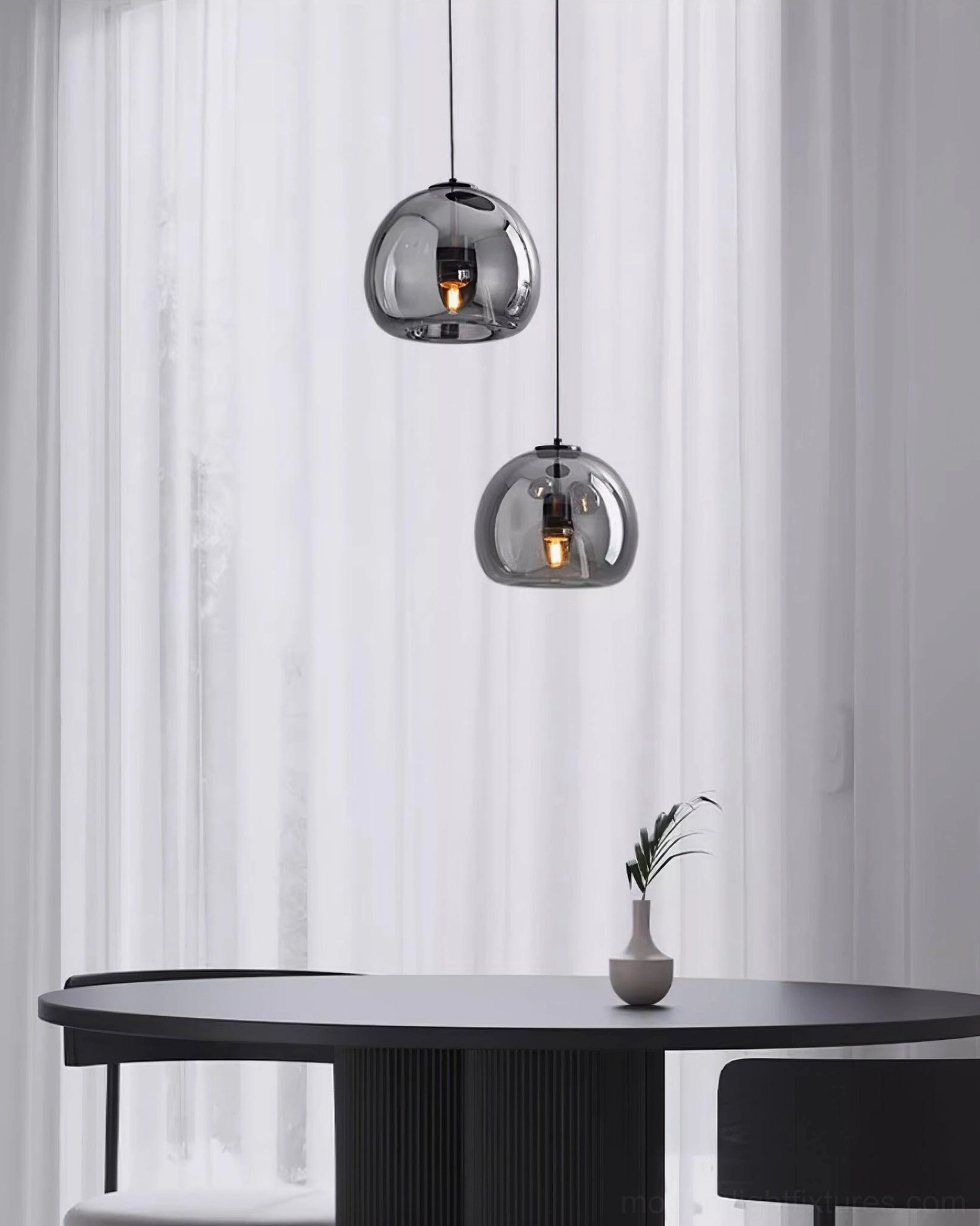 Sedona 3-head linear pendant light above dining table with warm ambient illumination