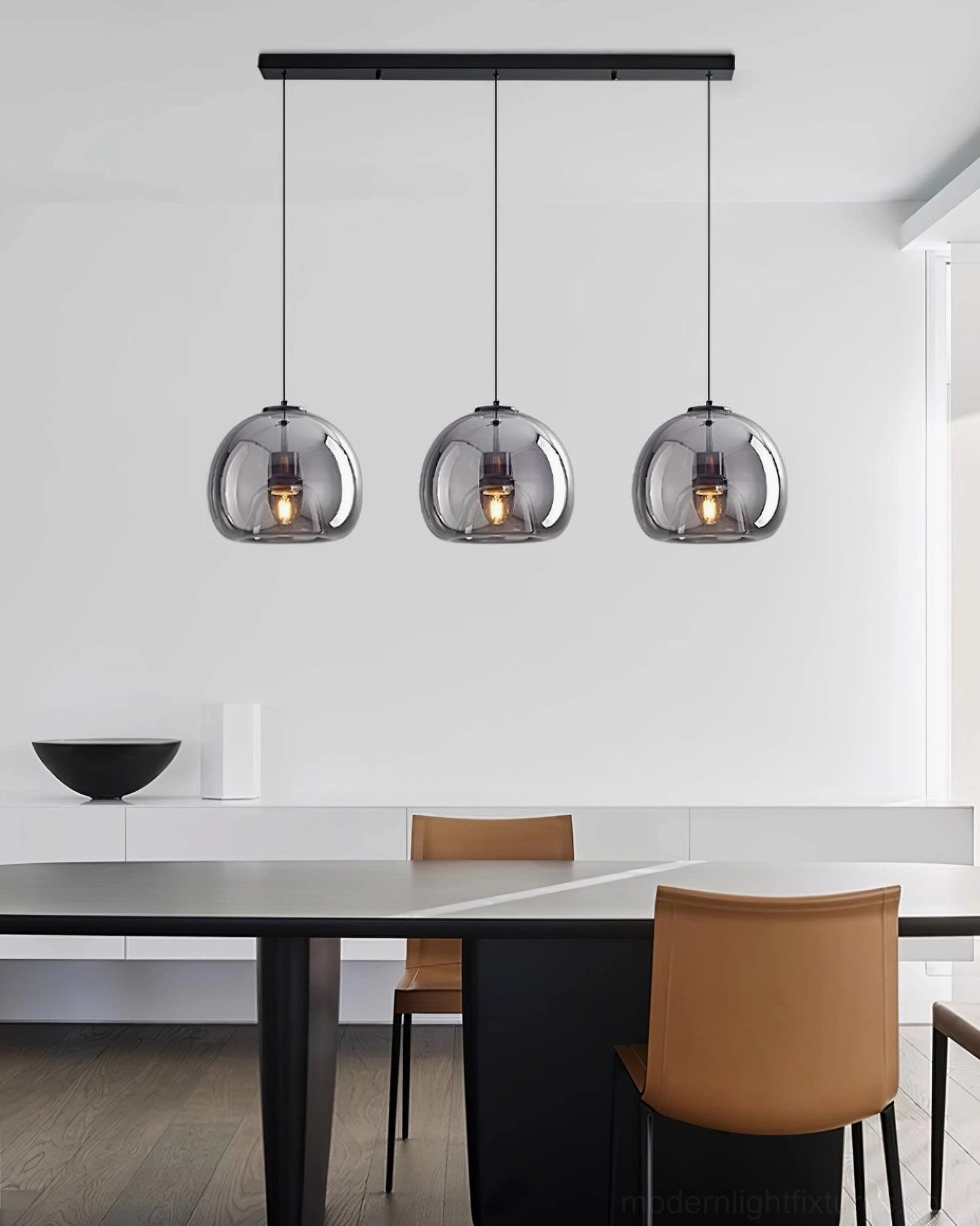 Sedona 3-head pendant light cluster creating constellation effect in dining space
