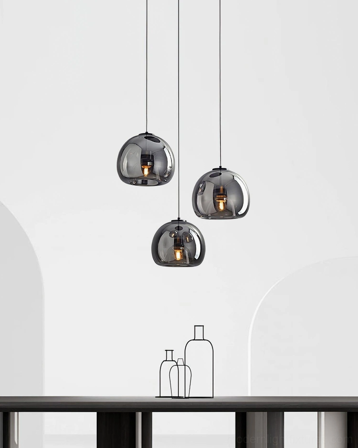 Sedona black smoked glass pendant light fixture in minimalist room setting