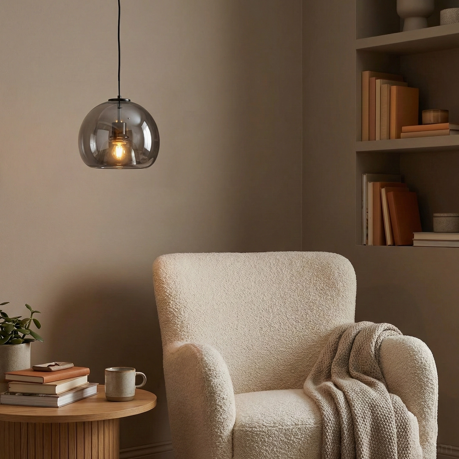 Sedona smoked glass pendant light fixture showing cognac color glass dome and exposed bulb detail